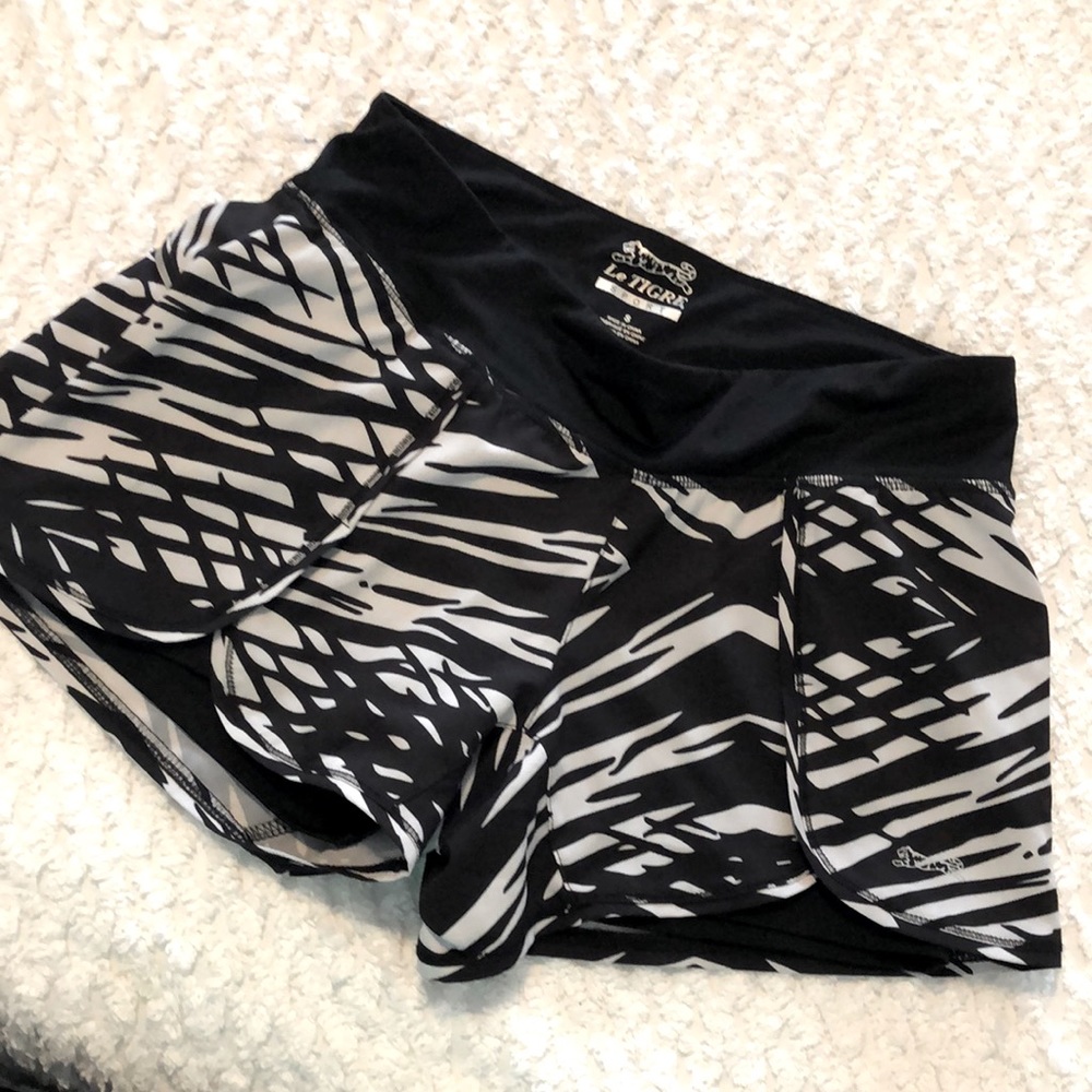 Black and white athletic shorts.